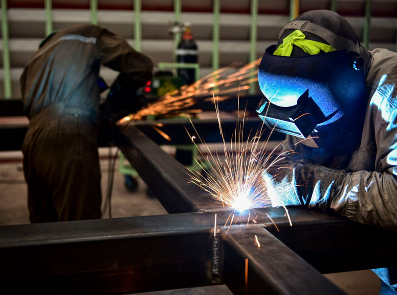 Man Performing Steel Welding Mechanical Services