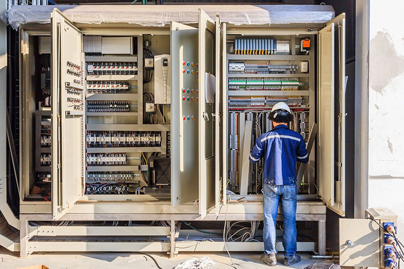 Man Performing Industrial Electrical Services